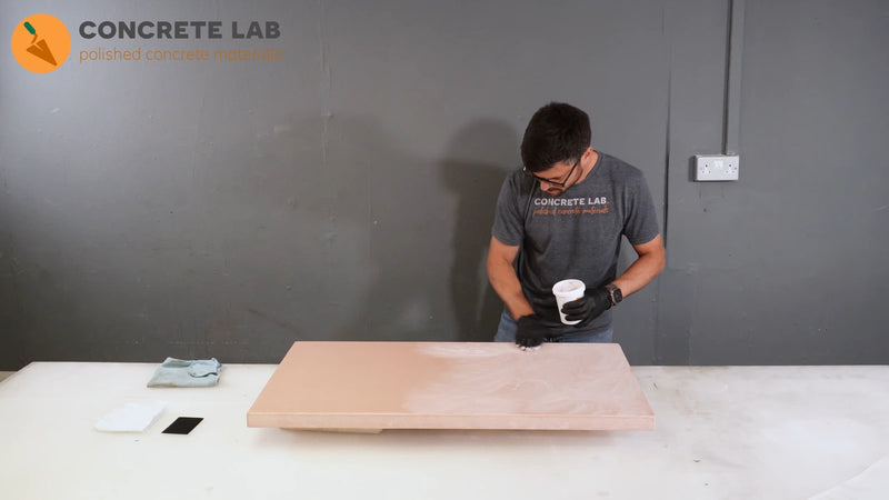 Working Smoothing Paste into a precast concrete worktop